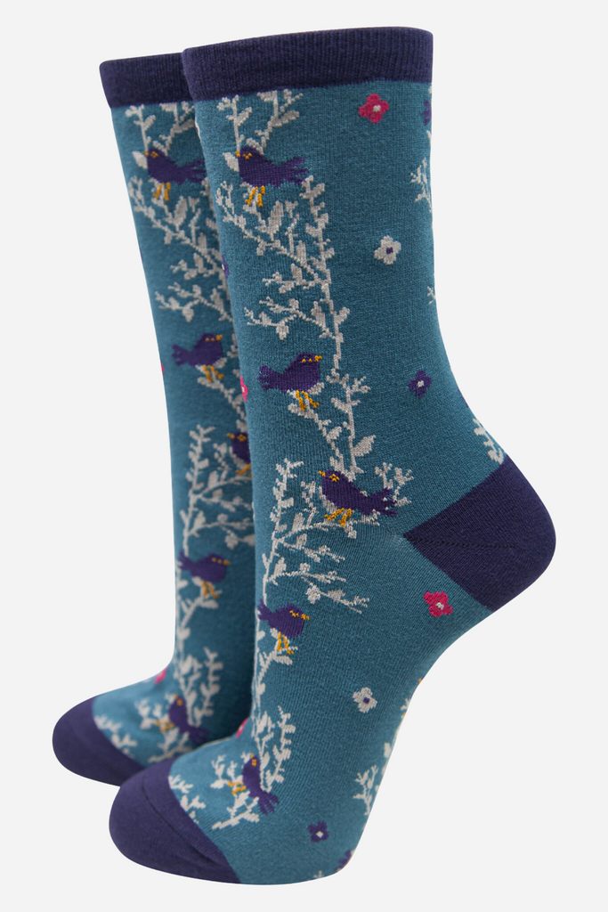 blue ankle socks with blackbirds and a floral print vine pattern