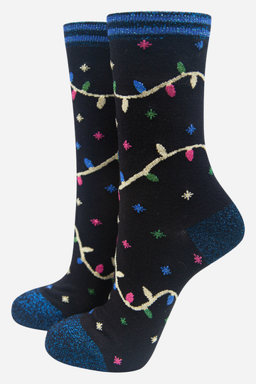 black bamboo socks with blue glitter heel, toe and trim with a multicoloured xmas lights patterns