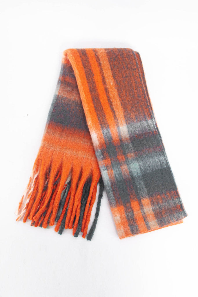 orange and grey traditional check scarf folded, showing clearly the tasselled fringe and small check pattern