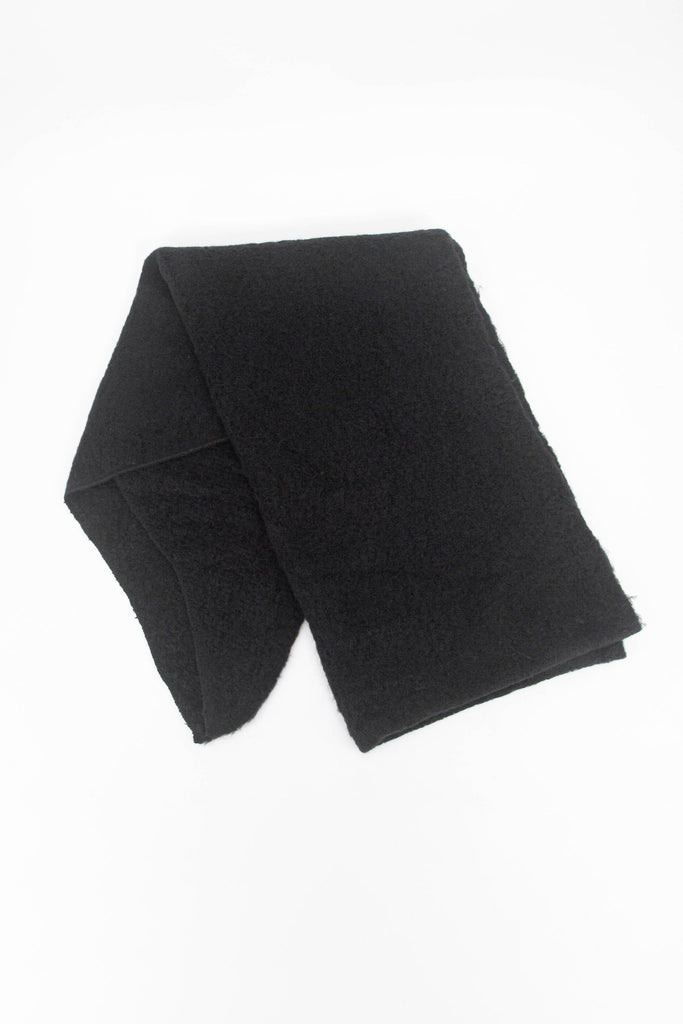 showing the scarf folded highlighting the solid plain black colour