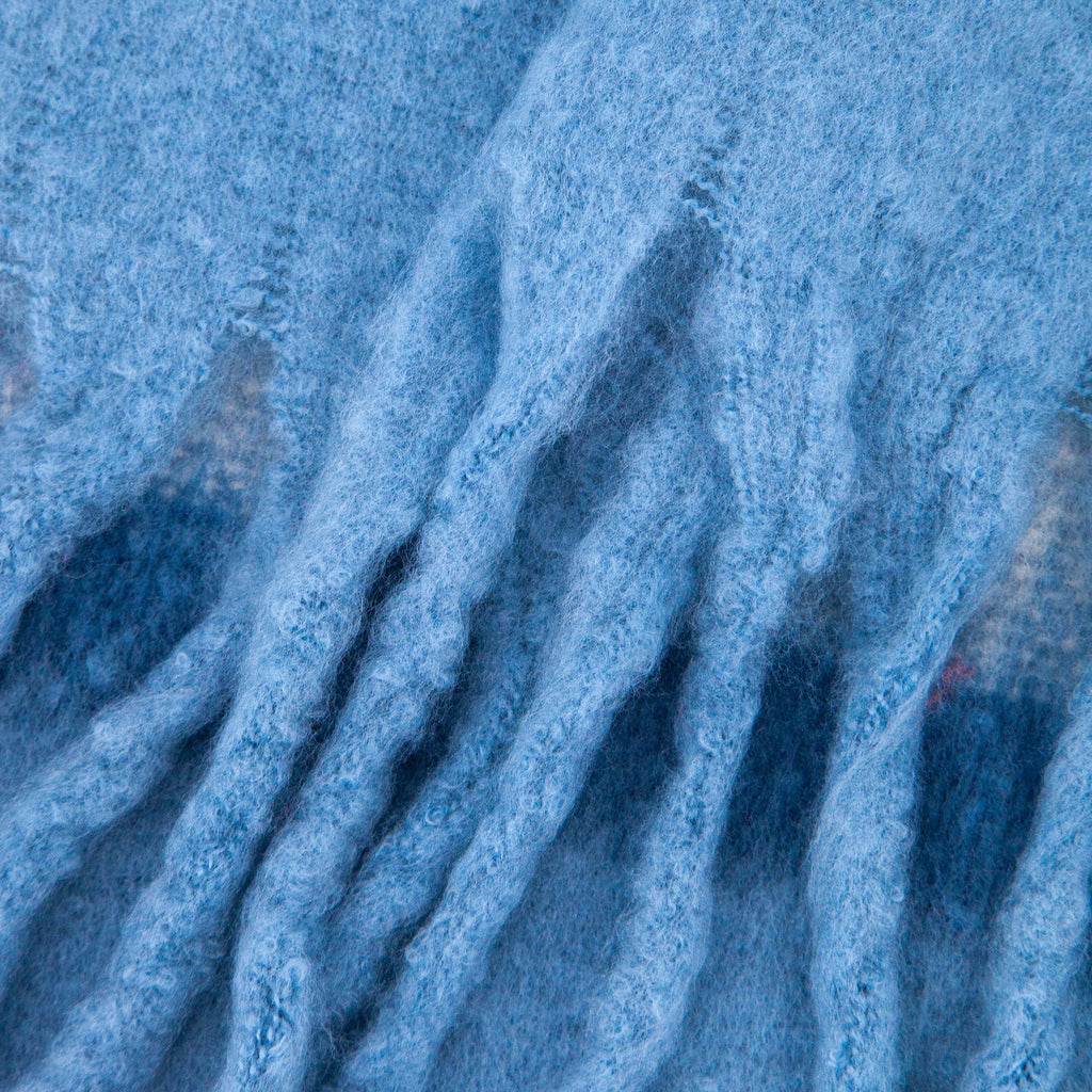close up of the soft viscose knitted material of the winter blanket scarf