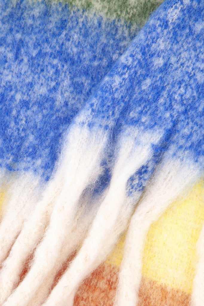 close up of the soft viscose knitted material of the winter blanket scarf