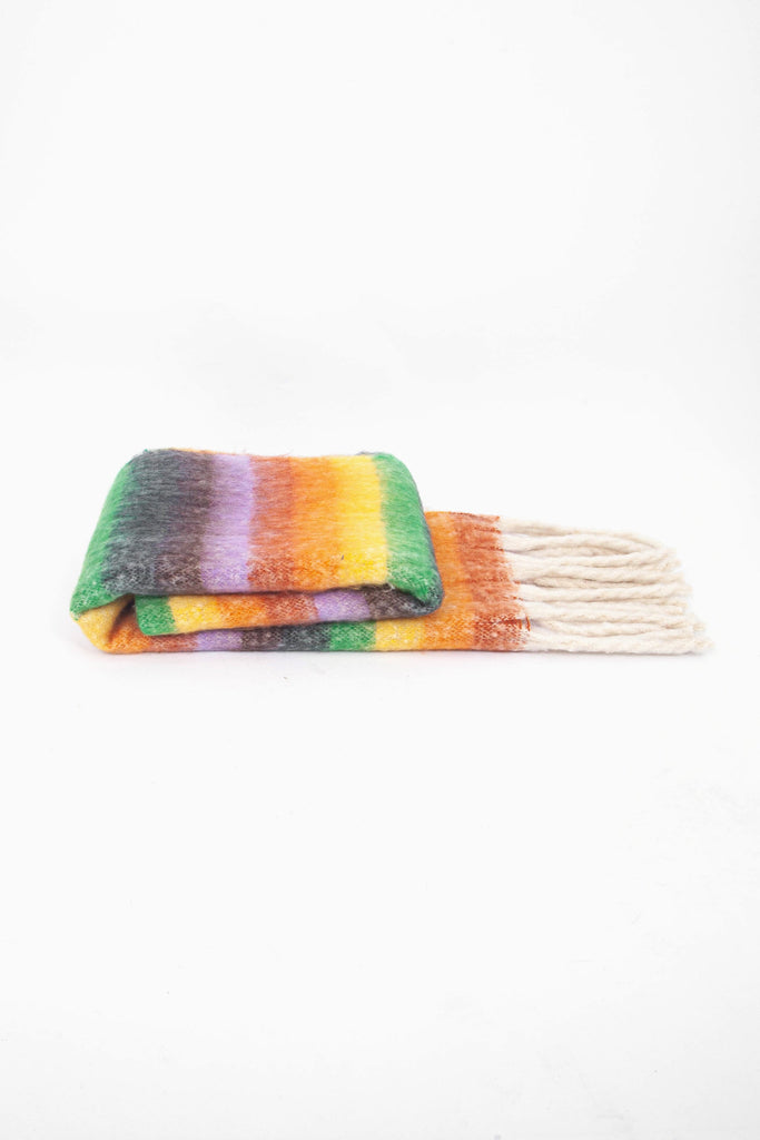 side view of the scarf when folder, showing the texture and thickness of the material. this scarf is warm and winter weight