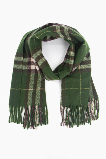 green scarf with a black and cream tartan plaid pattern, the scarf has a tasselled fringe edge