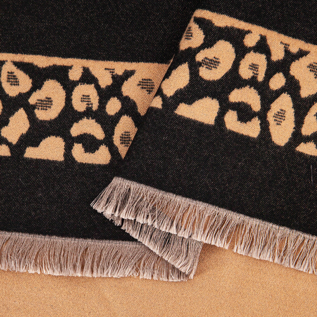 close up of the soft viscose knitted material of the winter blanket scarf