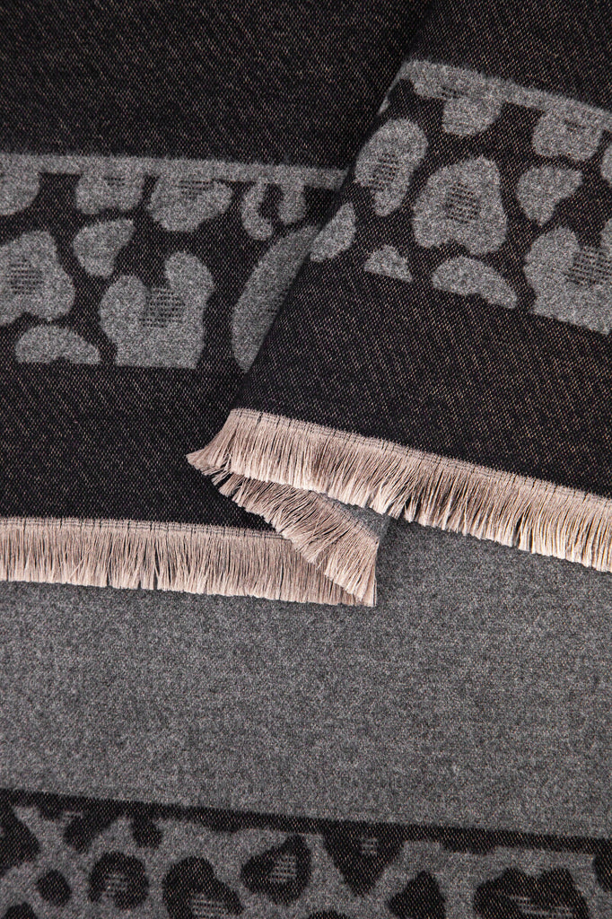 close up of the soft viscose knitted material of the winter blanket scarf