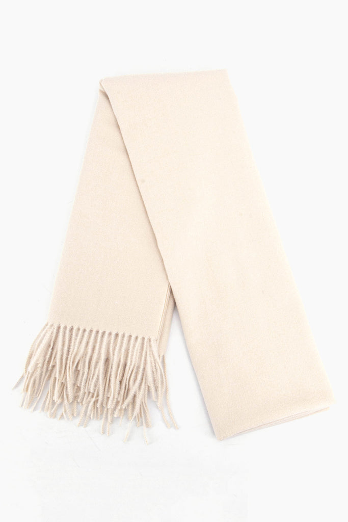 showing the scarf folded while laying flat, the plain cream design is shown