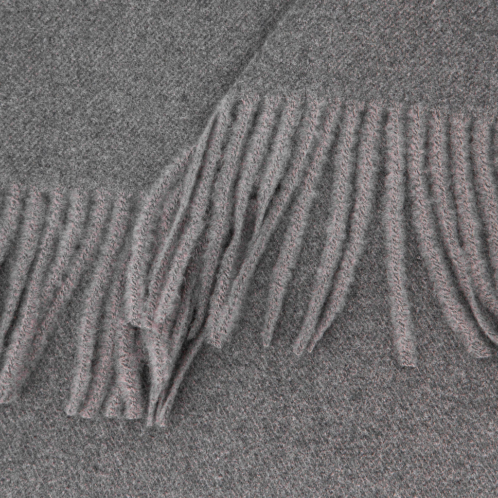 close up of the soft viscose knitted material of the winter blanket scarf