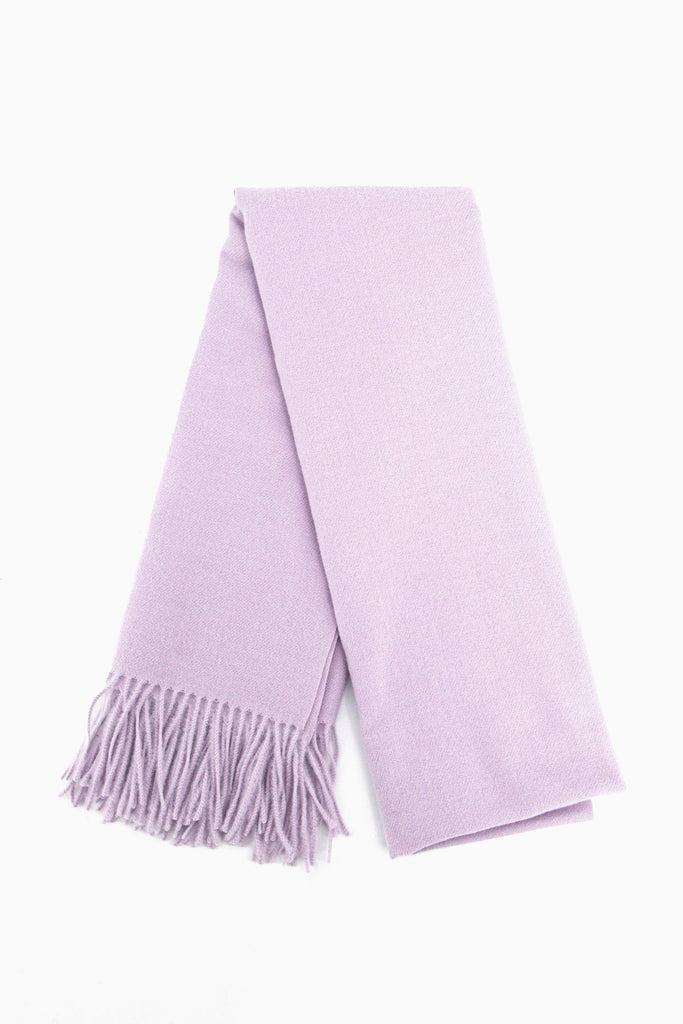 showing the scarf folded while laying flat, the plain lilac design is shown