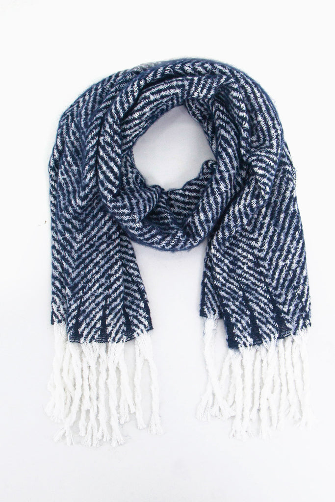 navy blue and white herringbone pattern winter scarf with white tassel trim