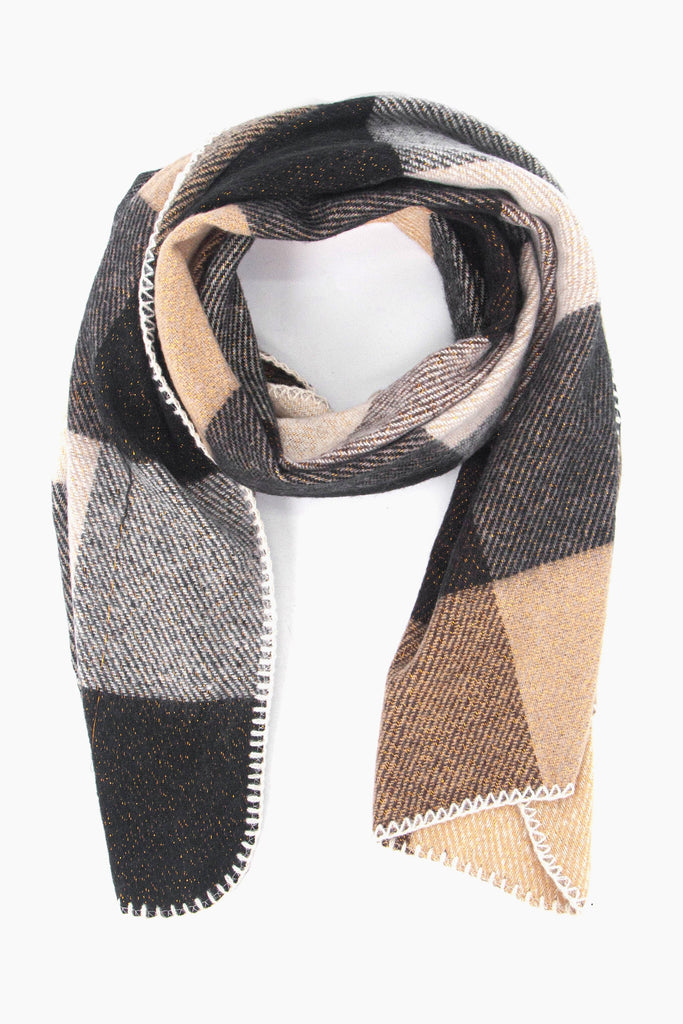 black and neutral check print winter scarf with a white stitched edge