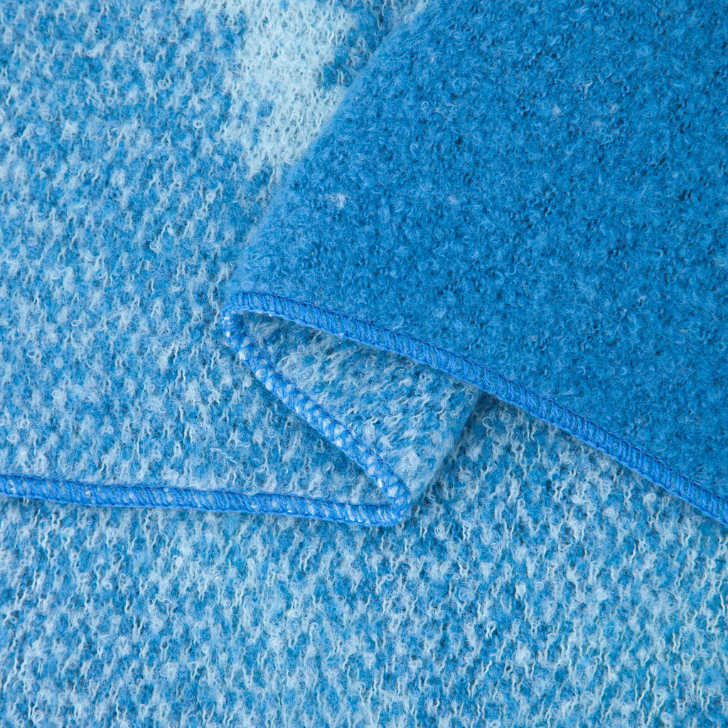 close up of the soft viscose knitted material of the winter blanket scarf