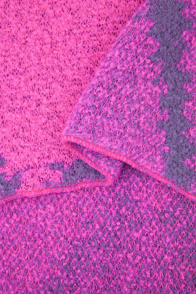 close up of the soft viscose knitted material of the winter blanket scarf