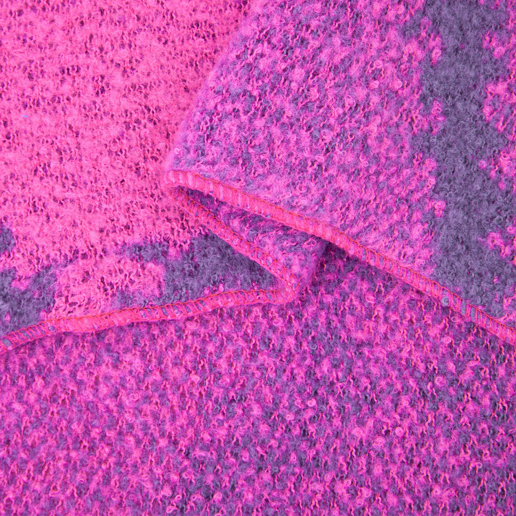 close up of the soft viscose knitted material of the winter blanket scarf
