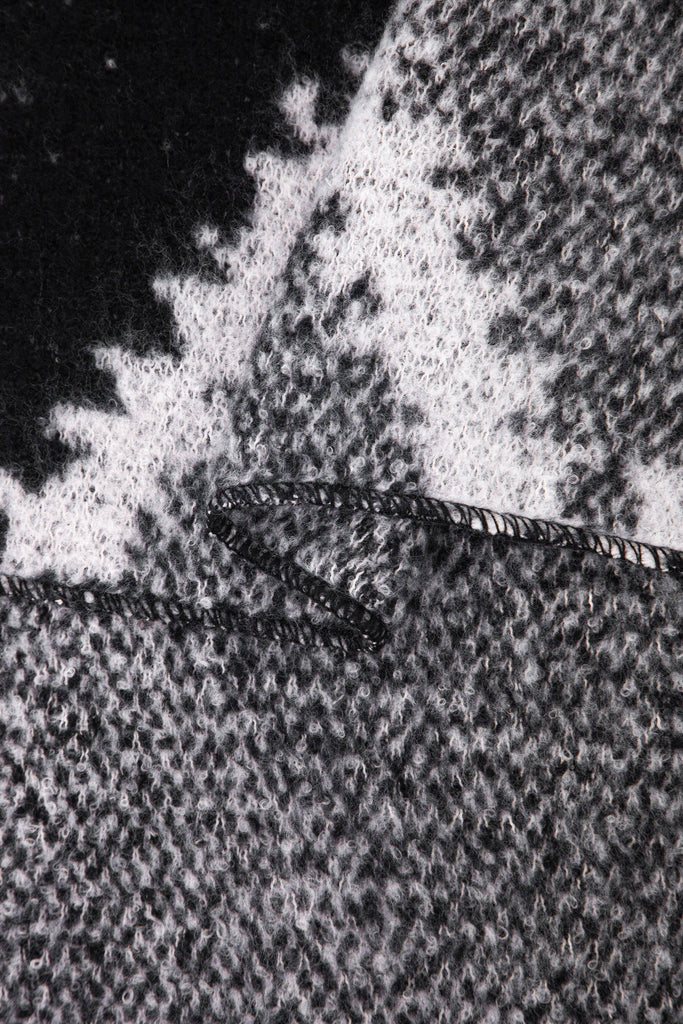 close up of the soft viscose knitted material of the winter blanket scarf