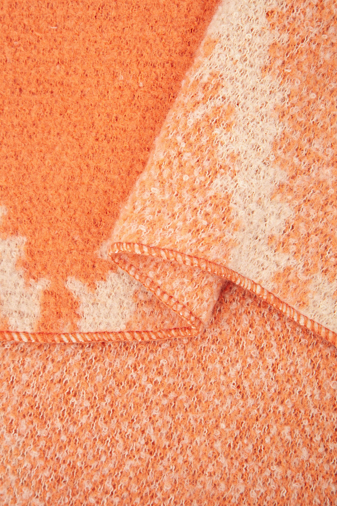 close up of the soft viscose knitted material of the winter blanket scarf