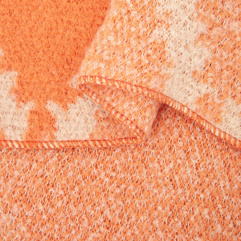 close up of the soft viscose knitted material of the winter blanket scarf