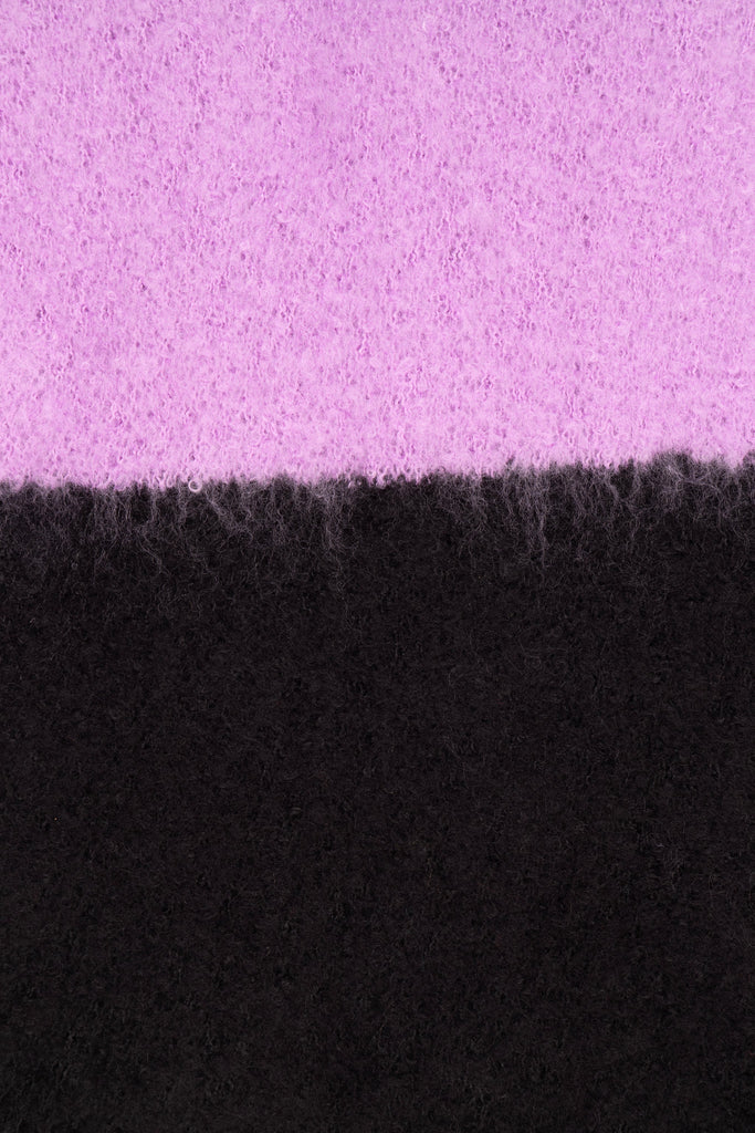 close up of the soft viscose knitted material of the winter blanket scarf