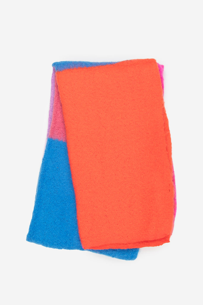 showing the scarf folded, the colourful colour block design is shown.