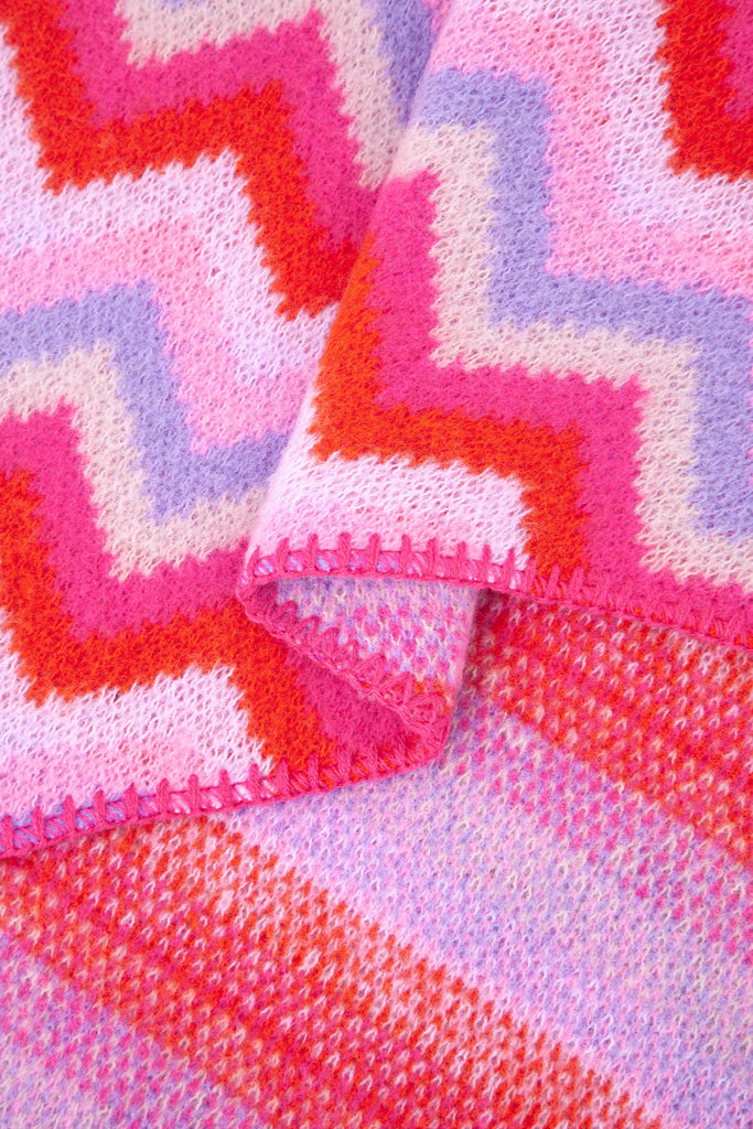 close up of the soft viscose knitted material of the winter blanket scarf
