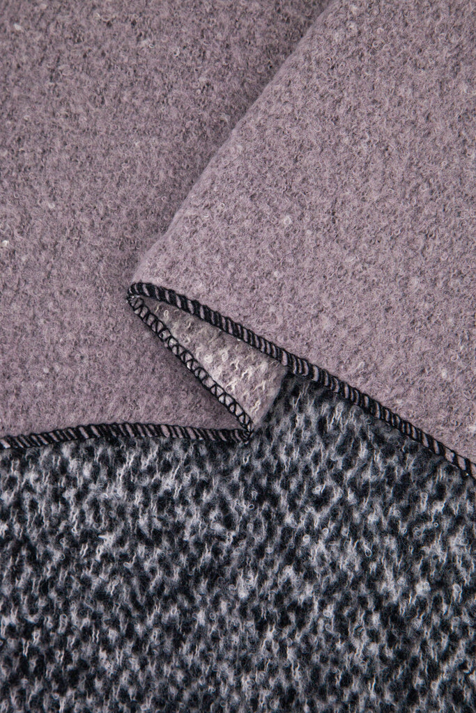 close up of the soft viscose knitted material of the winter blanket scarf