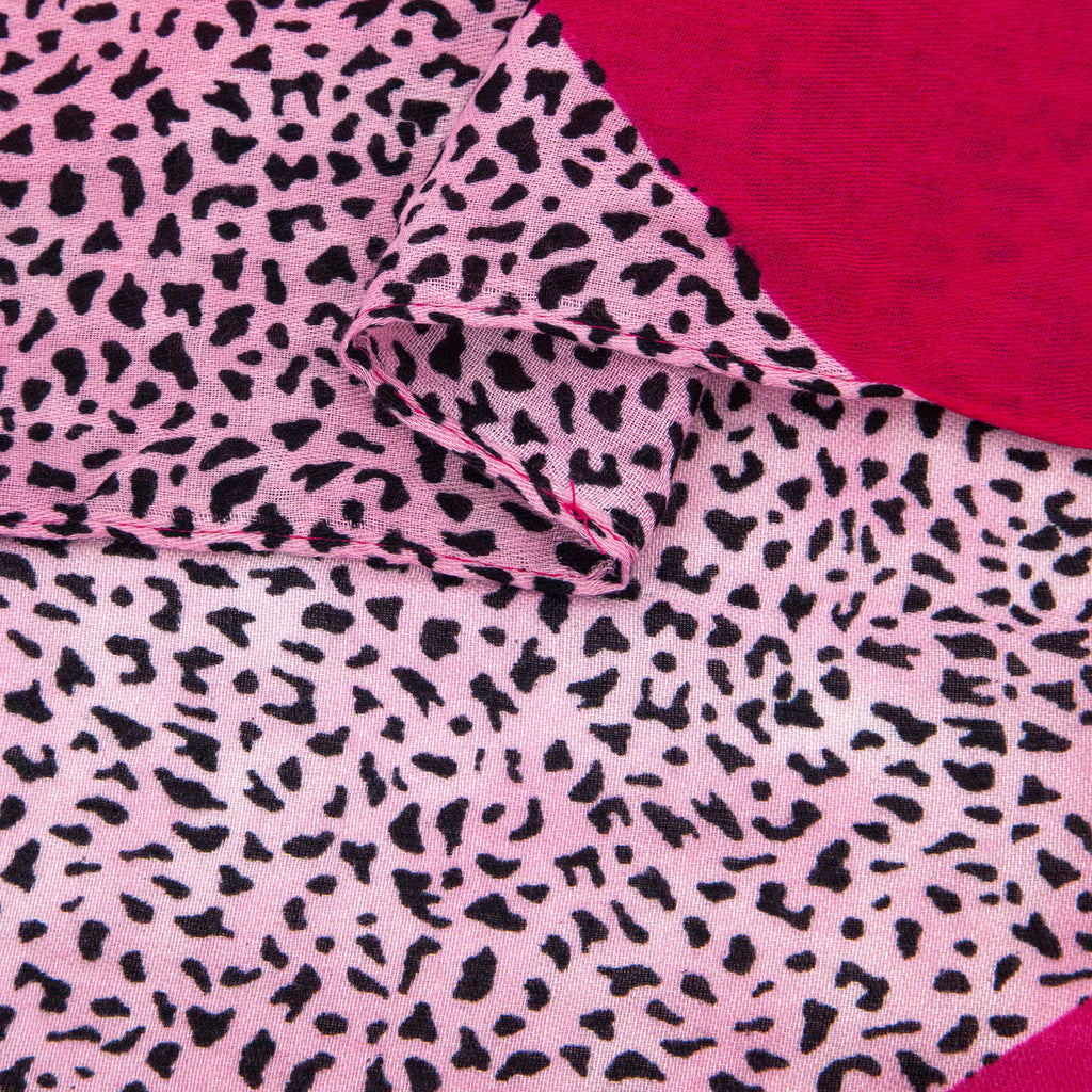 close up of the soft viscose fabric, the contrasting print is clearly visible