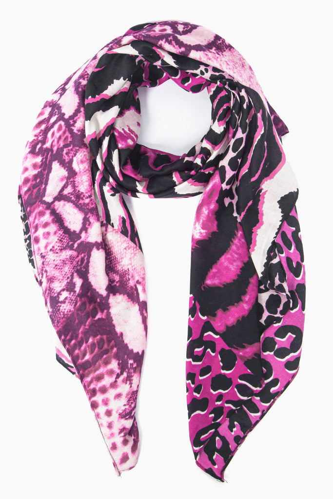 fuchsia pink mixed animal print lightweight scarf, the scarf has leopard, tiger and zebra print patterns