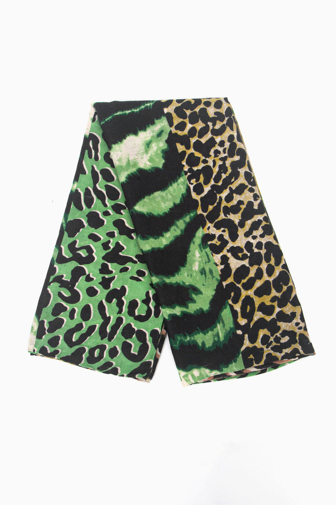 showing the scarf folded, the green ombre mixed animal print pattern is shown to cover the whole scarf