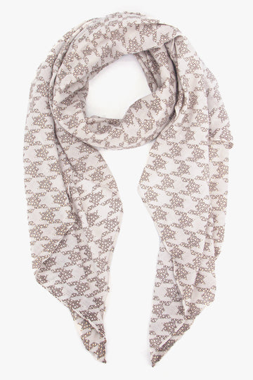 cream beige scarf with a houndstooth pattern and subtle foil accents