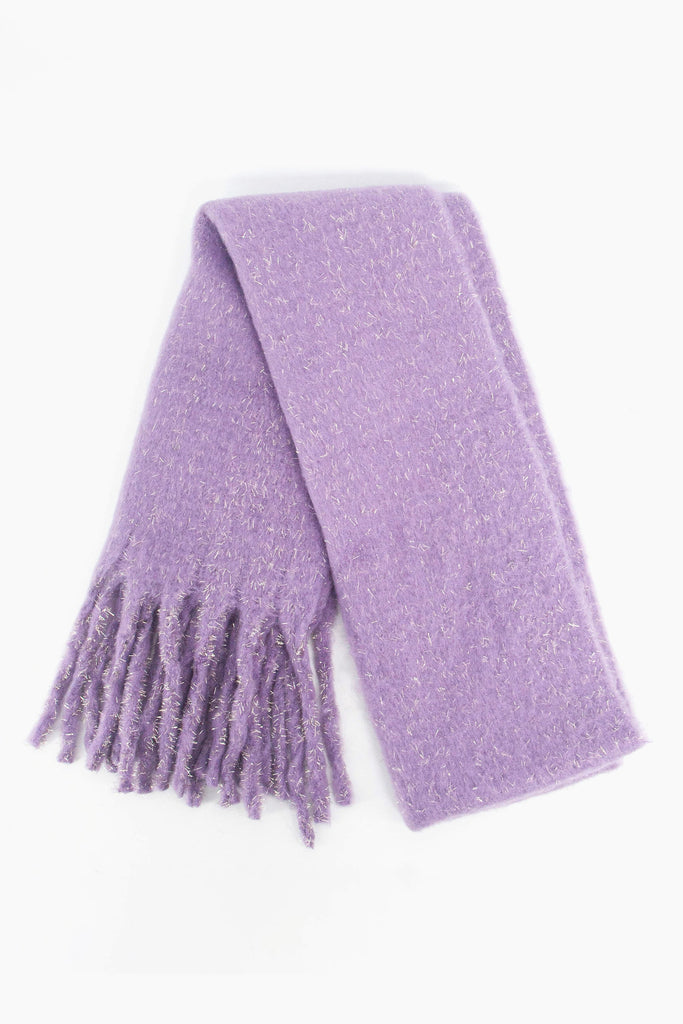 showing the scarf folded while laying flat, the lilac tone and sparkly silver tinsel fibre is shown