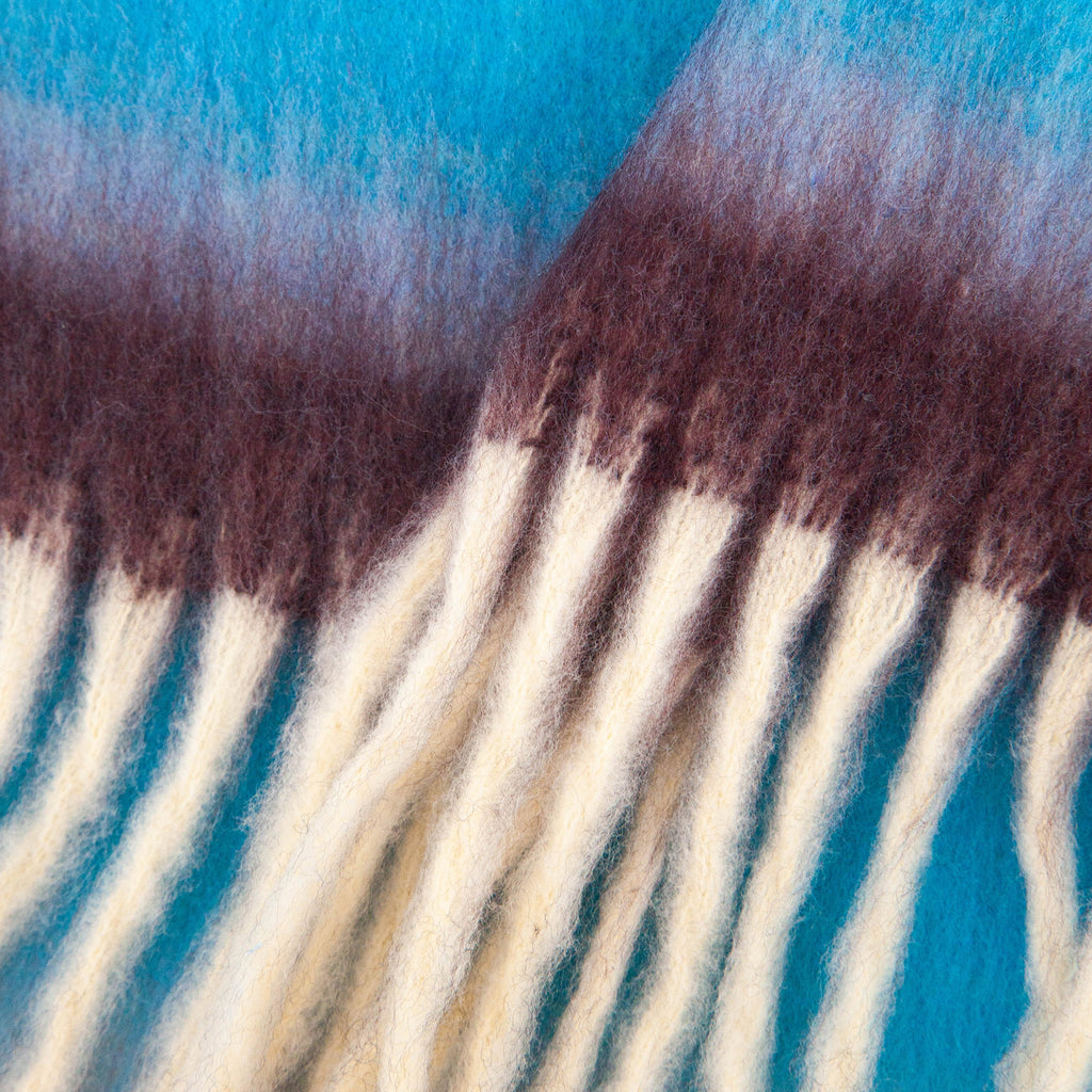 close up of the soft viscose knitted material of the winter blanket scarf