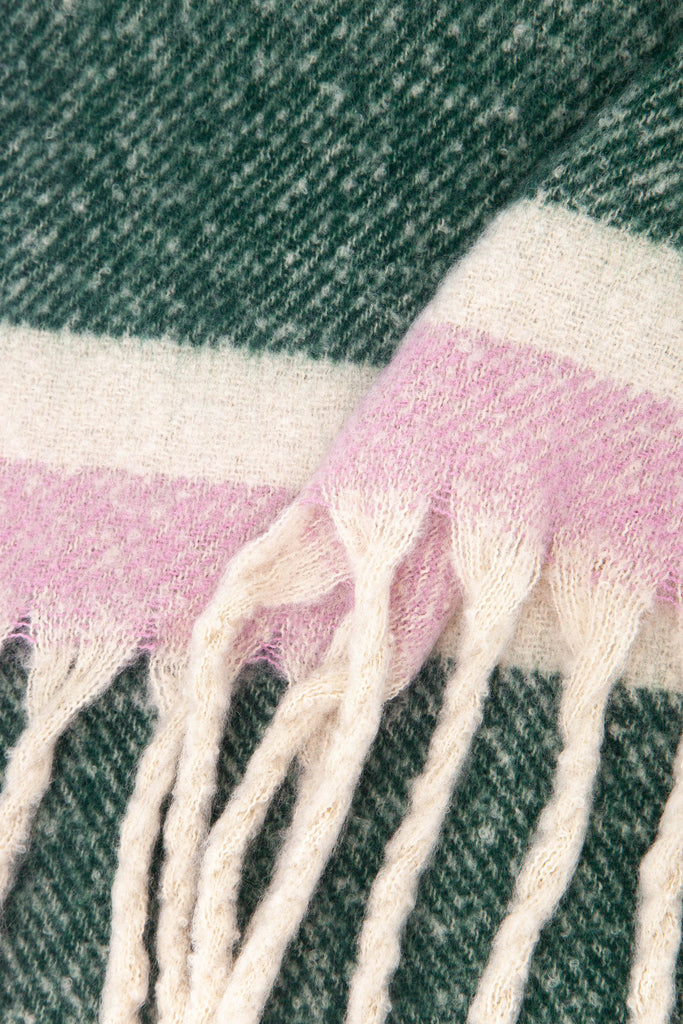 close up of the soft viscose knitted material of the winter blanket scarf
