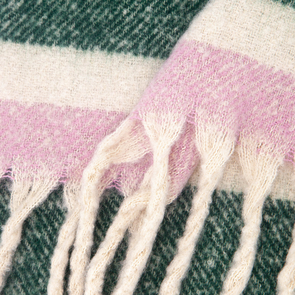 close up of the soft viscose knitted material of the winter blanket scarf