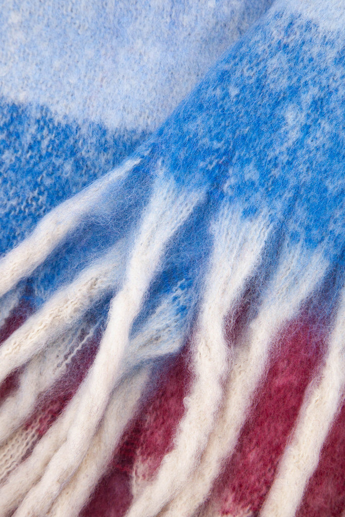 close up of the soft viscose knitted material of the winter blanket scarf