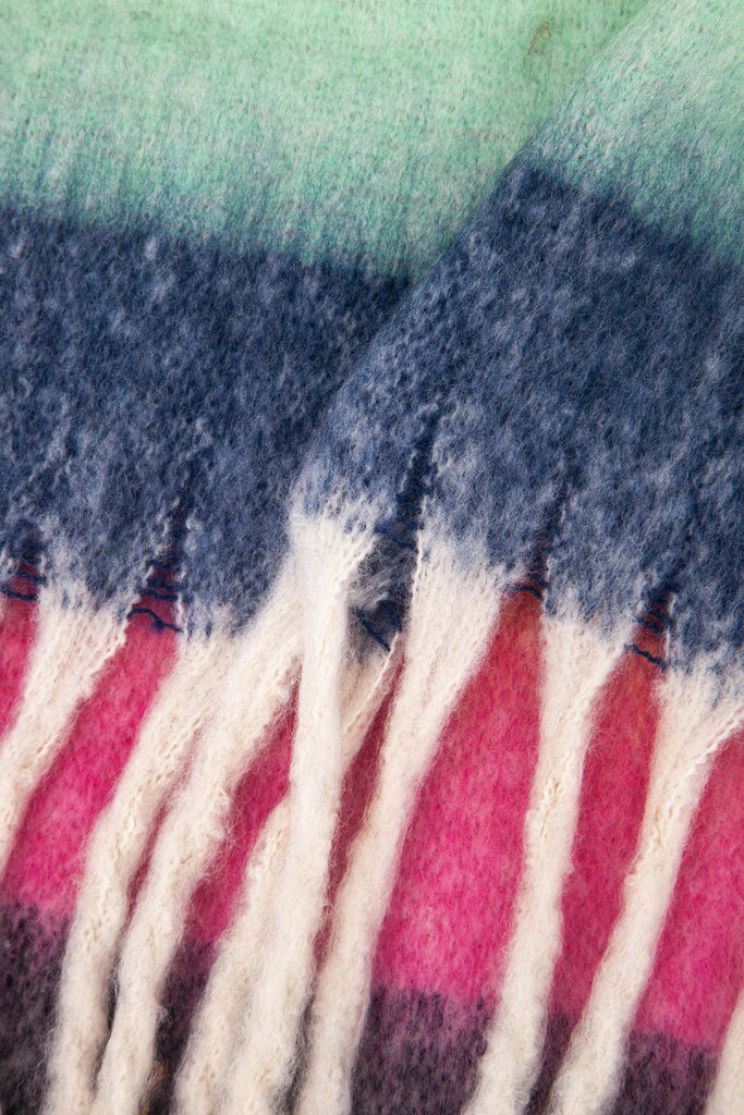 close up of the soft viscose knitted material of the winter blanket scarf