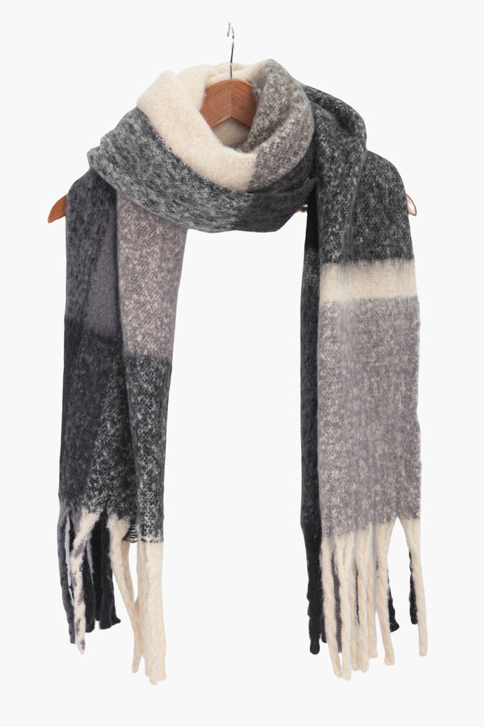 yara-black-square-colour-block-heavyweight-scarf-draped-on-coat-hanger