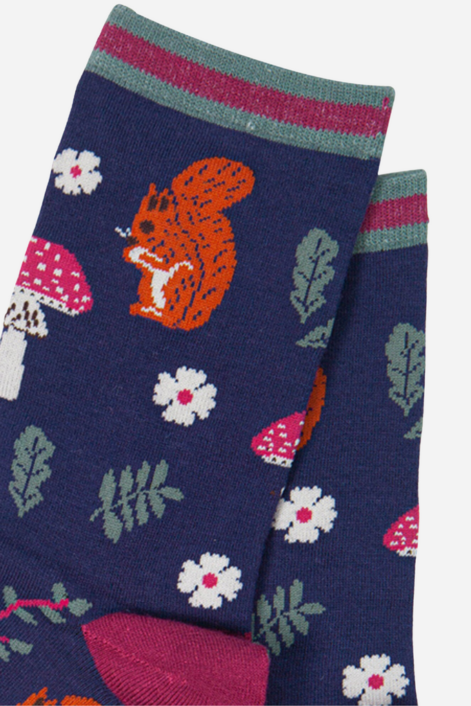 close up of the red squirrel design on the blue ankle socks