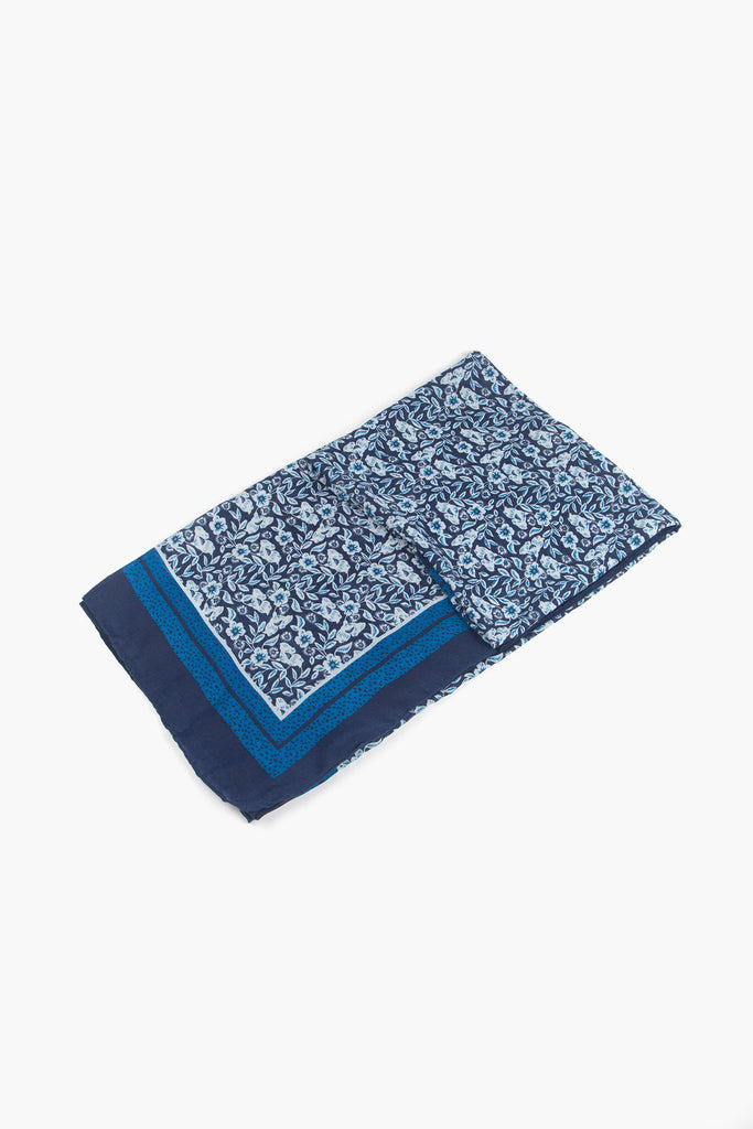 lightweight-floral-scarf-blue-colour-bock-border-laying-folded