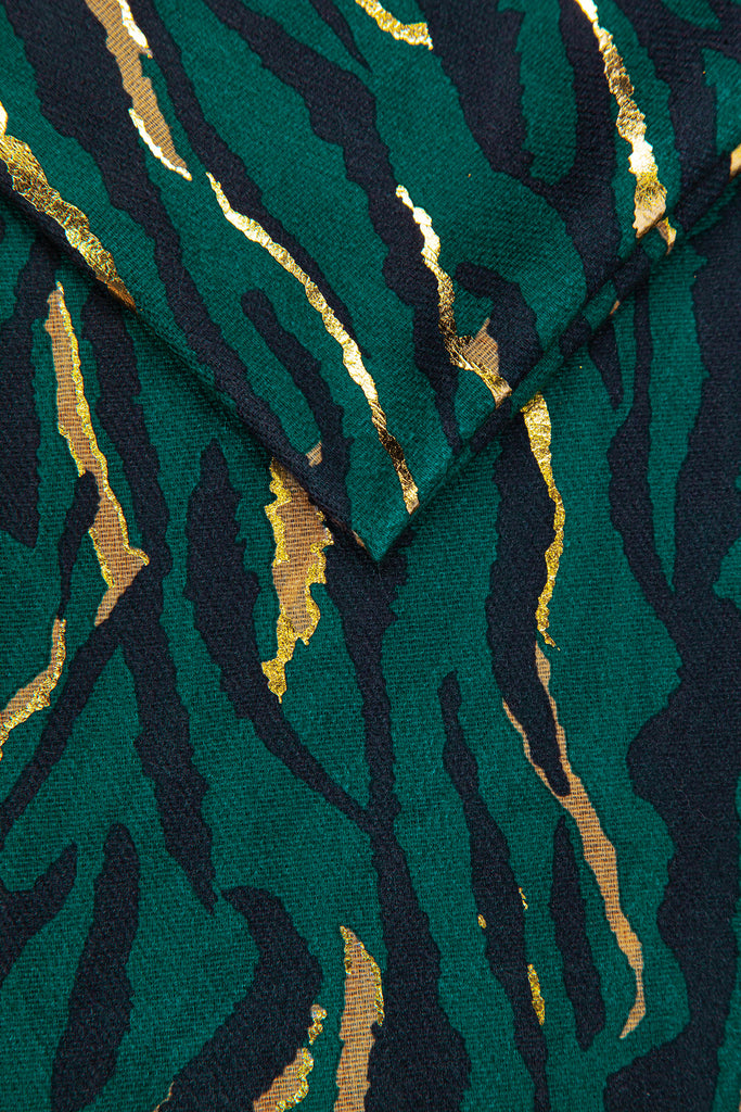 close up of the green and gold zebra print pattern