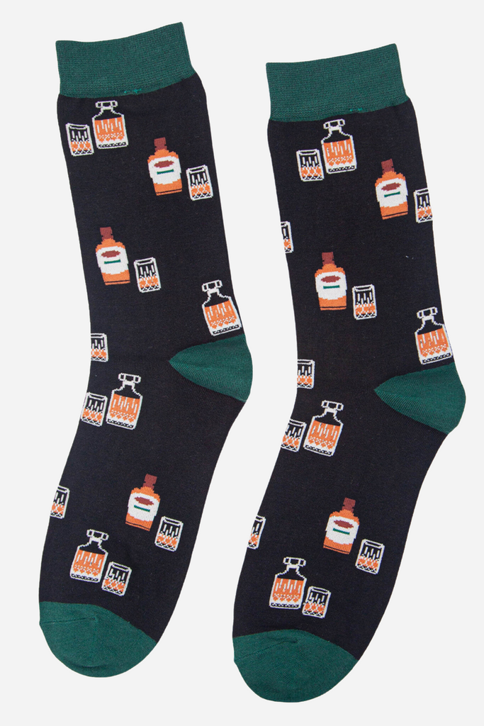 mens black and green socks with whisky bottles, decanters and glasses