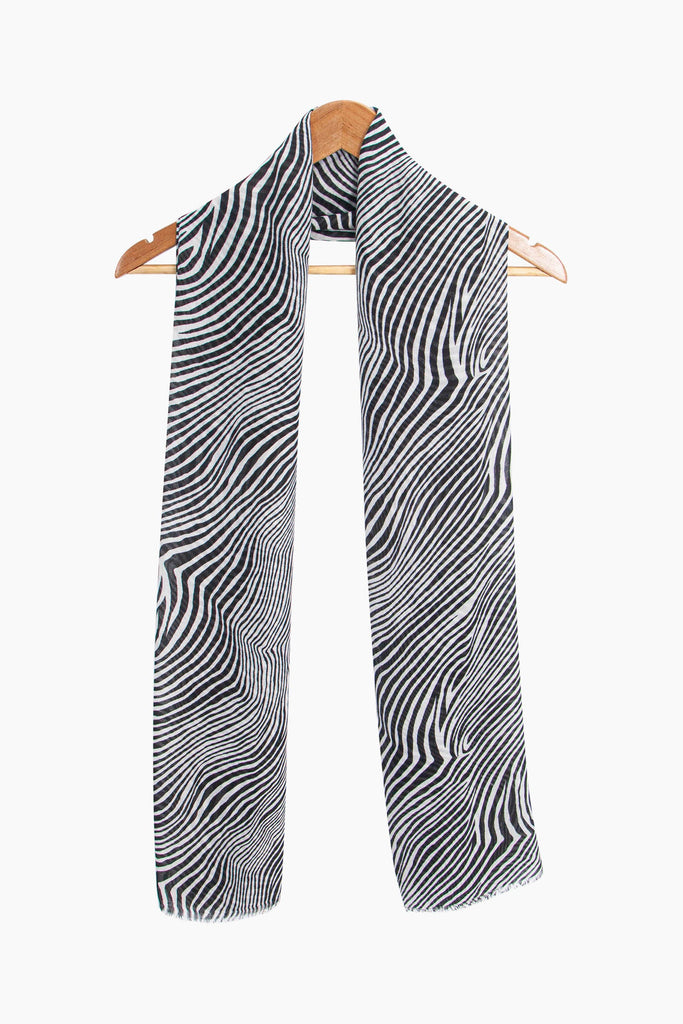 phoenix-lightweight-scarf-black-zebra-print-draped-around-coat-hanger