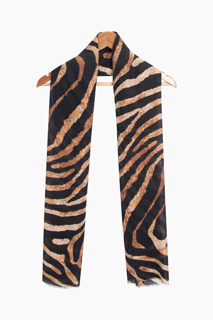 phoenix-lightweight-scarf-neutral-zebra-print-draped-around-coat-hanger