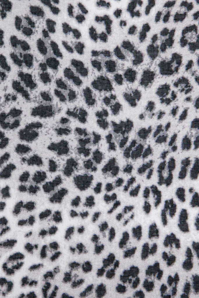 odessa-lightweight-scarf-white-leopard-print-folded-straight-edge