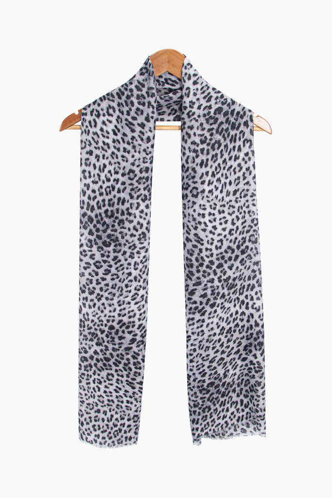odessa-lightweight-scarf-white-leopard-print-on-coat-hanger