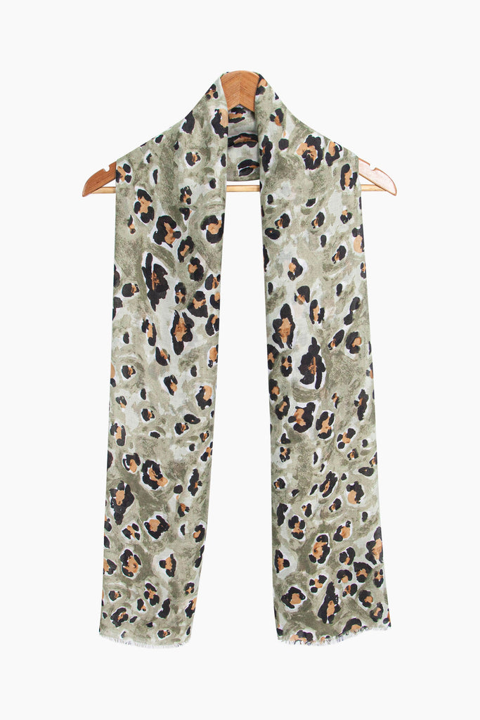 raya-lightweight-scarf-khaki-leopard-print-draped-around-coat-hanger