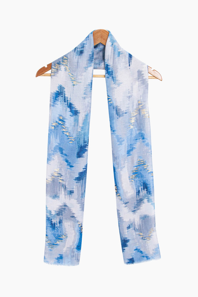 rumi-lightweight-scarf-blue-glitter-ikat-print-on-coat-hanger