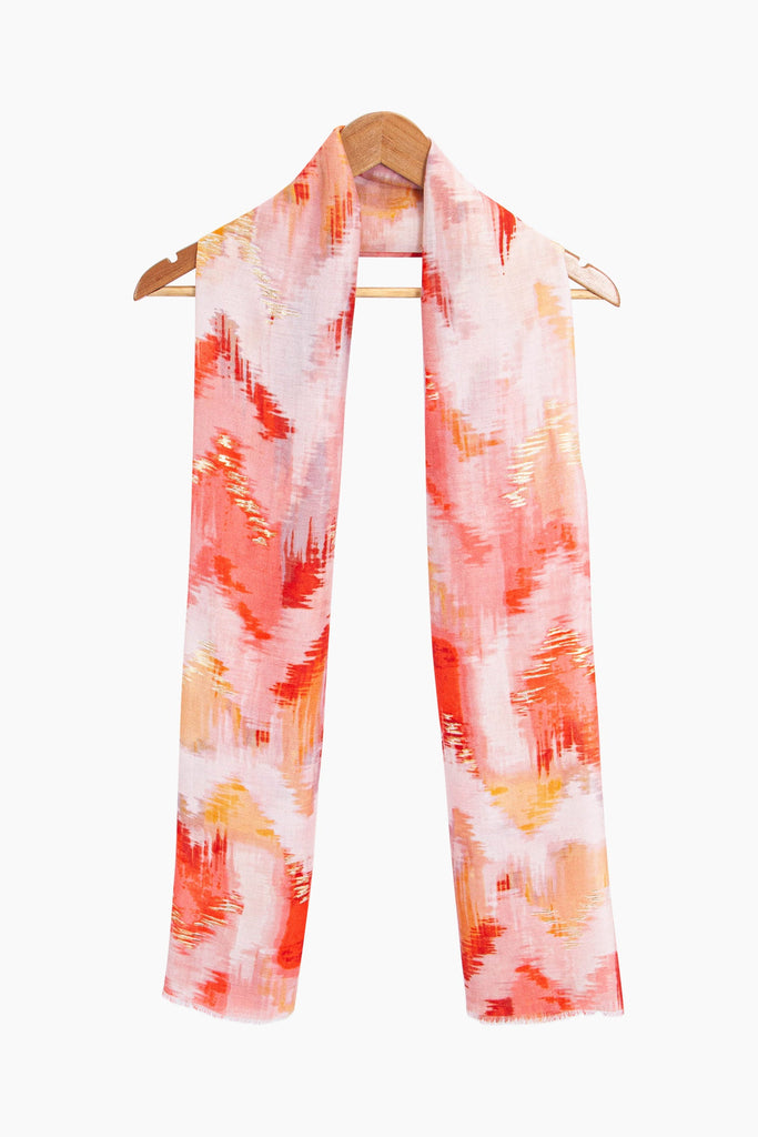 rumi-lightweight-scarf-red-glitter-ikat-print-on-coat-hanger