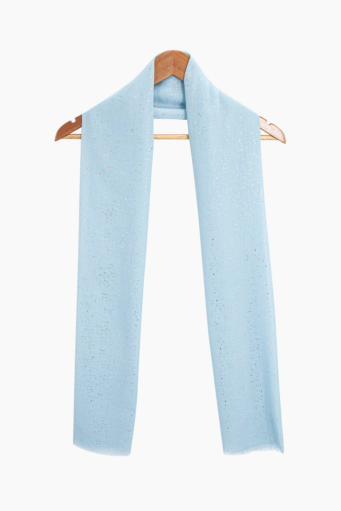 marisol-lightweight-scarf-blue-glitter-draped-around-a-coat-hanger
