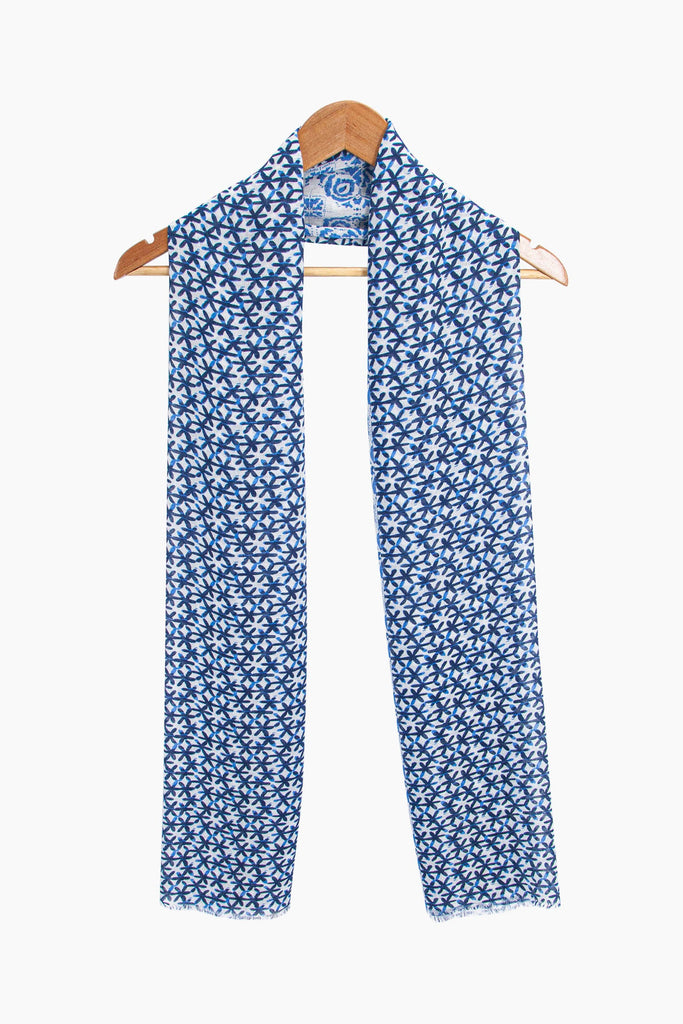 marcie-lightweight-scarf-blue-multi-print-draped-on-coat-hanger