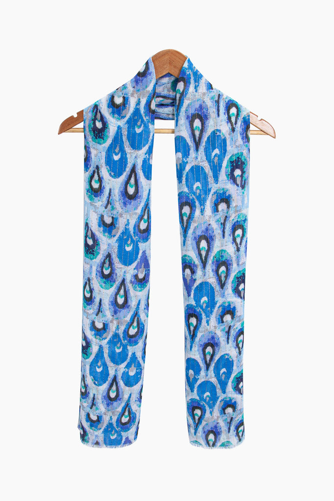 adler-lightweight-scarf-blue-gold-teardrop-draped-around-coat-hanger